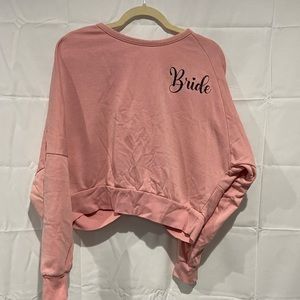 Bride sweater with black glitter writing and open twisted back